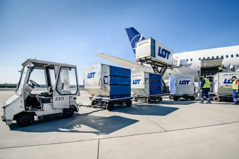 Unloading cargos from LOT Polish Cargo Airplane